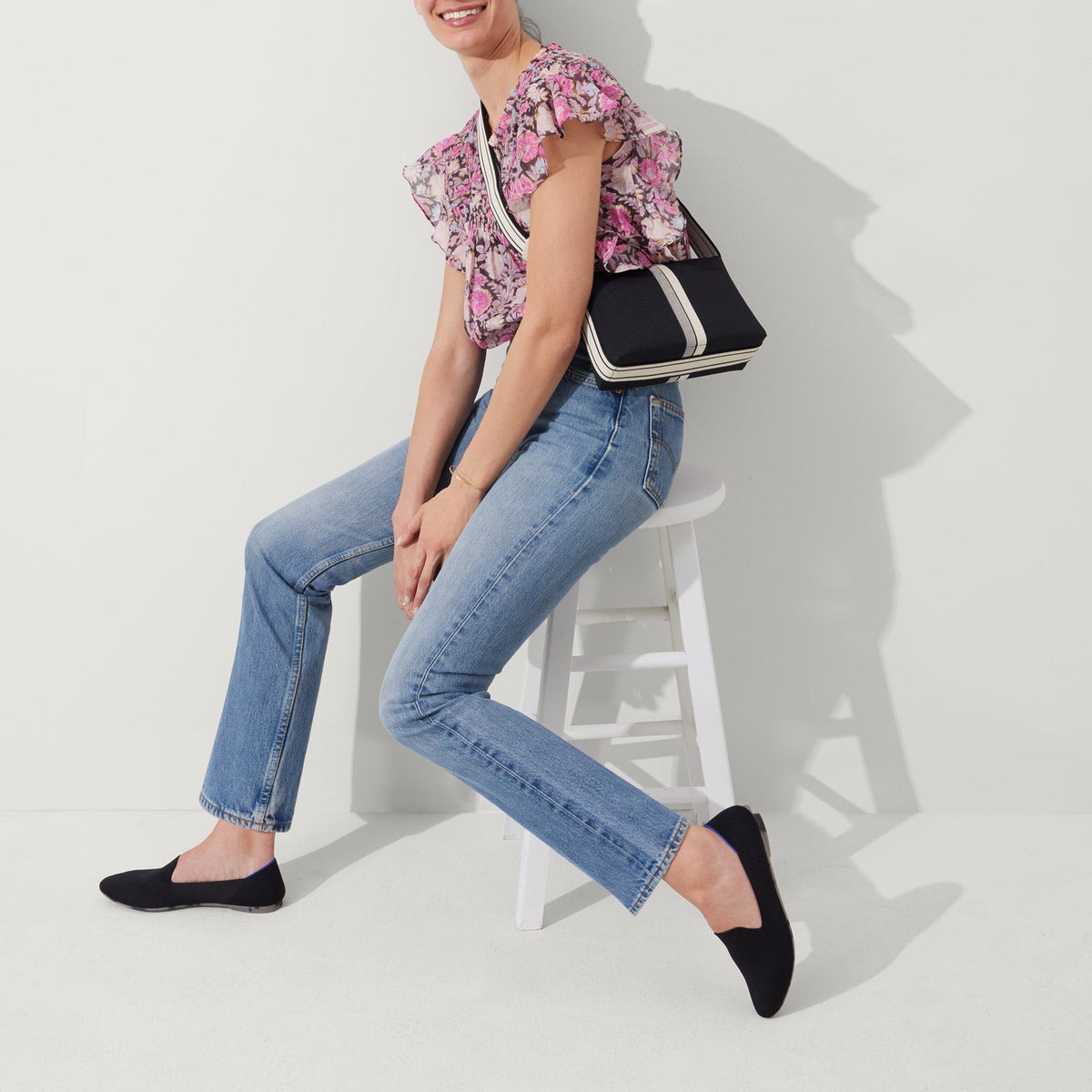 The Casual Crossbody in Black and Ivory Stripe | Rothys Bags