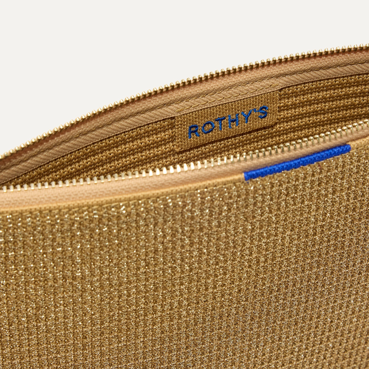 The Convertible Clutch in Glitzy Gold | Rothys Bags
