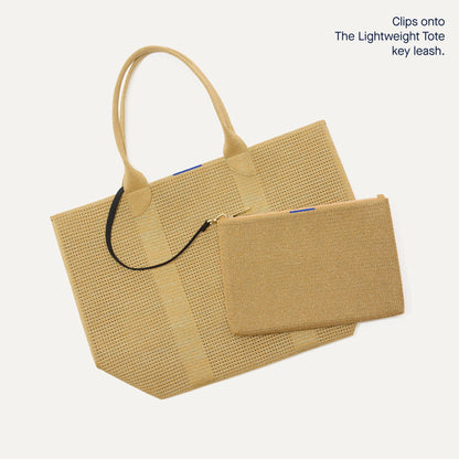 The Convertible Clutch in Glitzy Gold | Rothys Bags